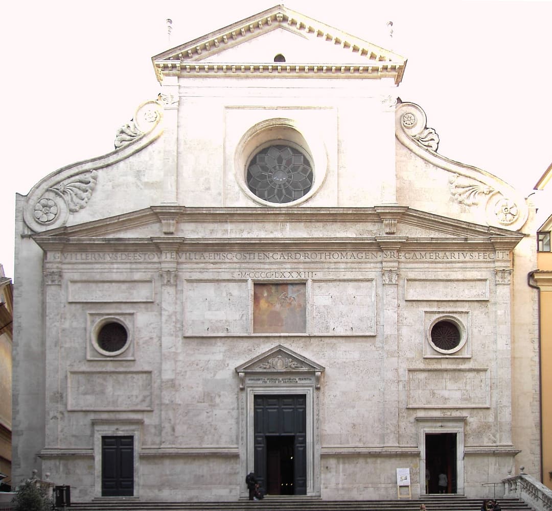 Frontal view of the Renaissance travertine façade of Sant'Agostino.
