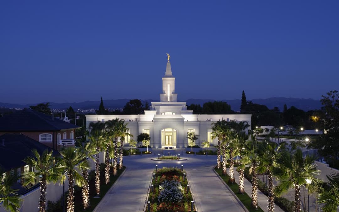 Symmetrical front view of the Córdoba Argentina Temple at twilight.