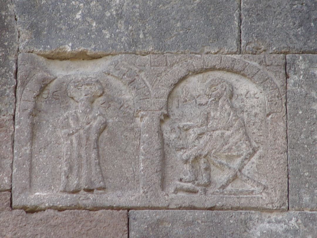 A close-up of the frescoes, depicting biblical scenes and saints.