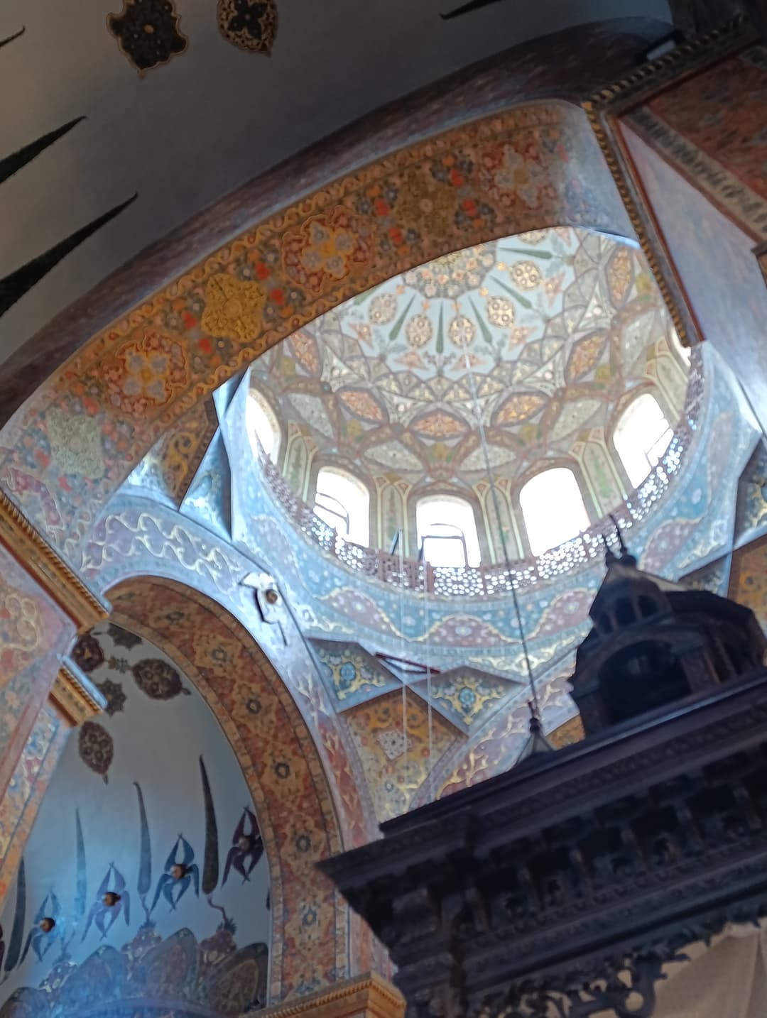 Interior view looking up at the decorated dome of Etchmiadzin Cathedral