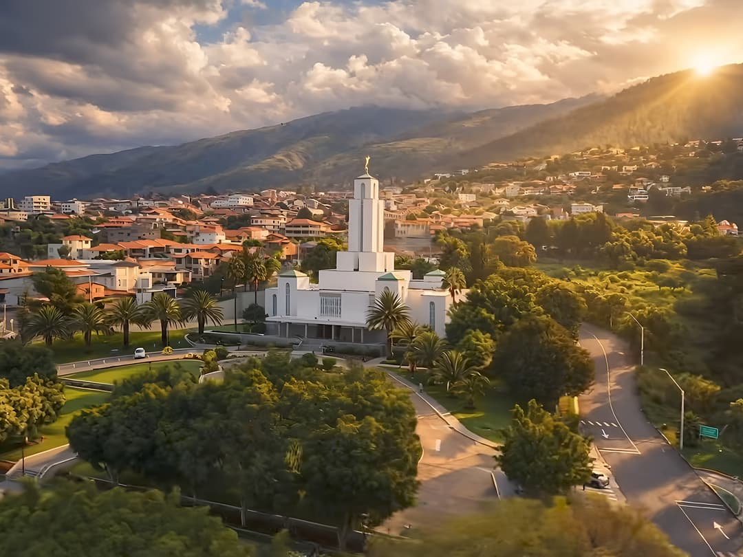 Aerial golden hour view of the Cochabamba Bolivia Temple and mountains.