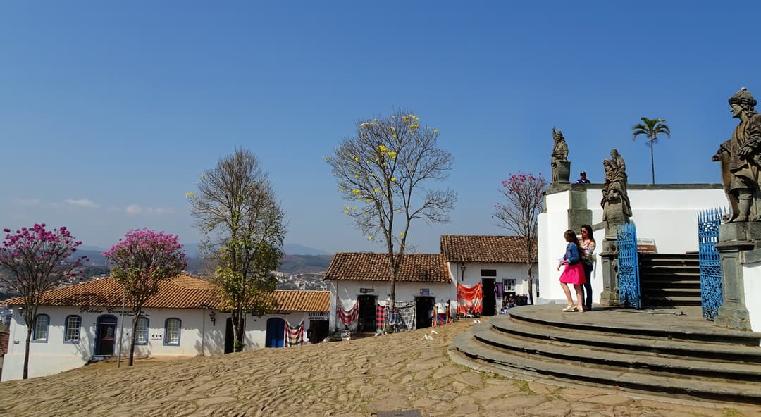 Terrace with Aleijadinho's prophet statues overlooking colonial houses