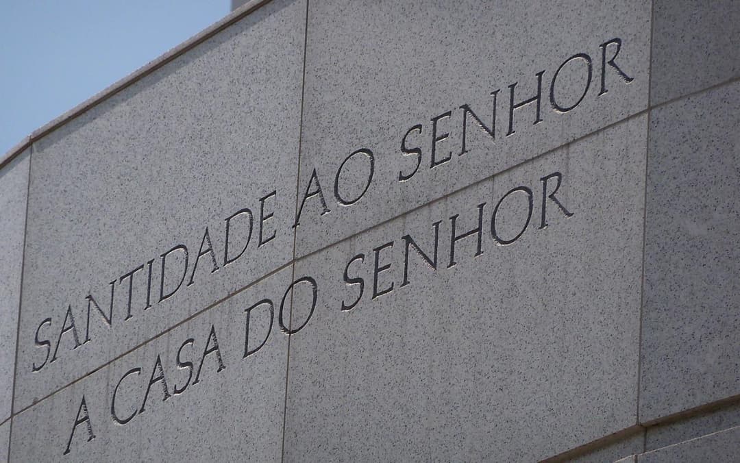Detail of the carved exterior granite inscription on the temple wall.