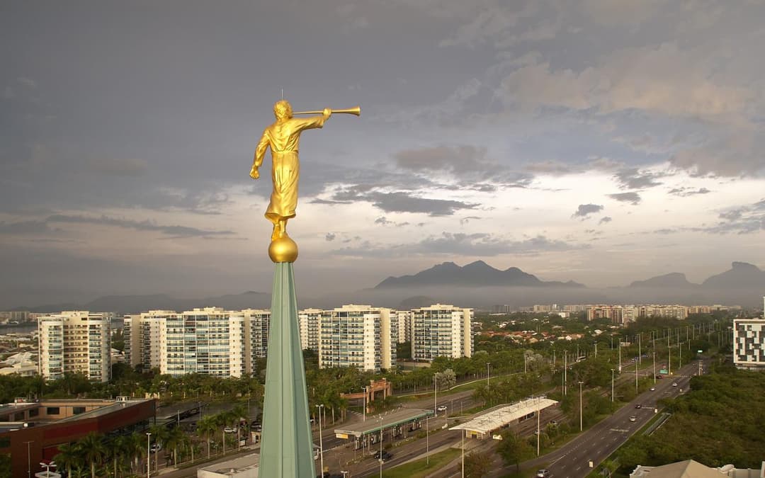 Golden Angel Moroni statue atop the spire, overlooking Rio de Janeiro.