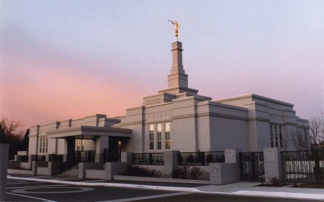 Edmonton Alberta Temple exterior at sunset, with single spire.