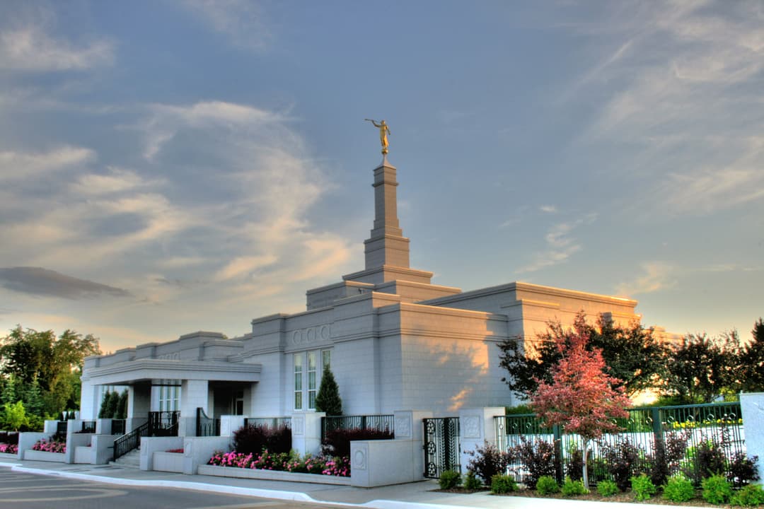 Edmonton Alberta Temple exterior at golden hour, featuring Angel Moroni.