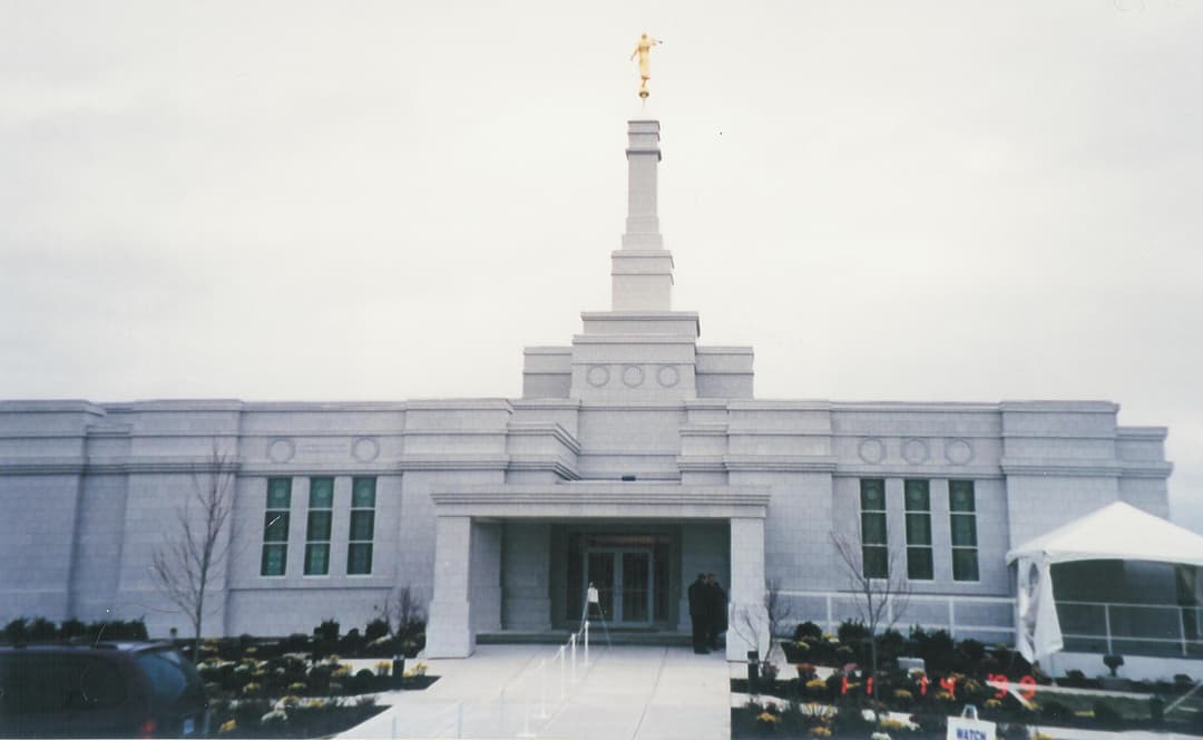 Halifax Nova Scotia Temple front view, single spire with Moroni, overcast.