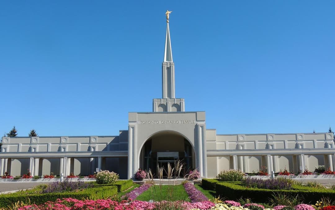 A serene reflection of the temple in the water.