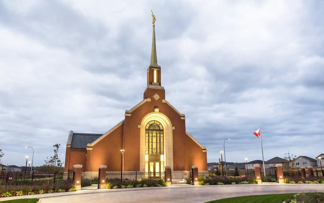 Front entrance of the Winnipeg Manitoba Temple at twilight.