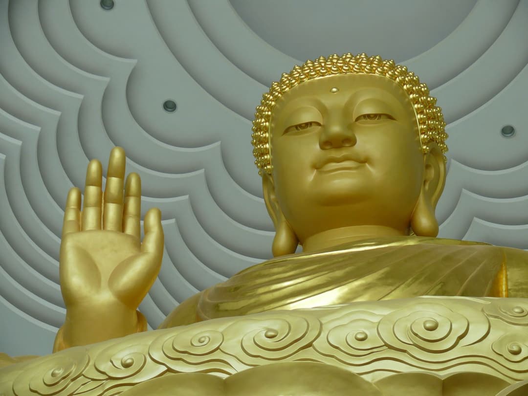 Monumental gilded Buddha statue inside Famen Temple