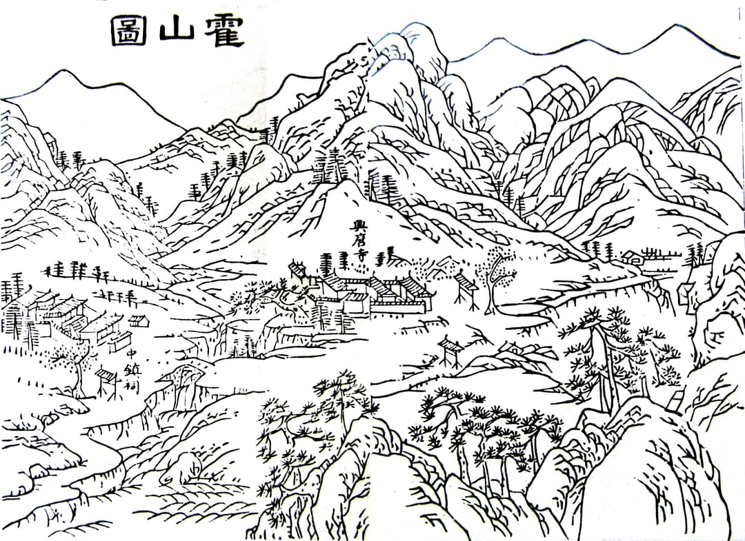 A Taoist temple nestled amidst the mountains.