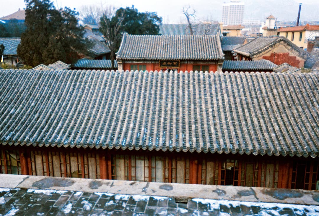 High-angle view of traditional tiled roofs and timber buildings at Mount Tai.
