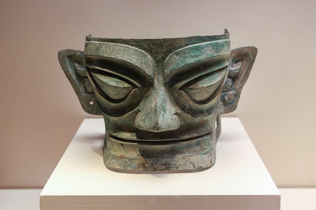 An ancient bronze mask on display inside the Sanxingdui Museum.