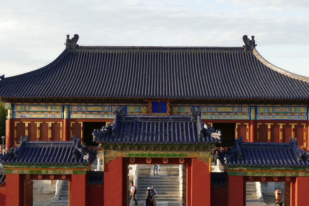 Huangqian Hall and blue-tiled gates in late afternoon sunlight