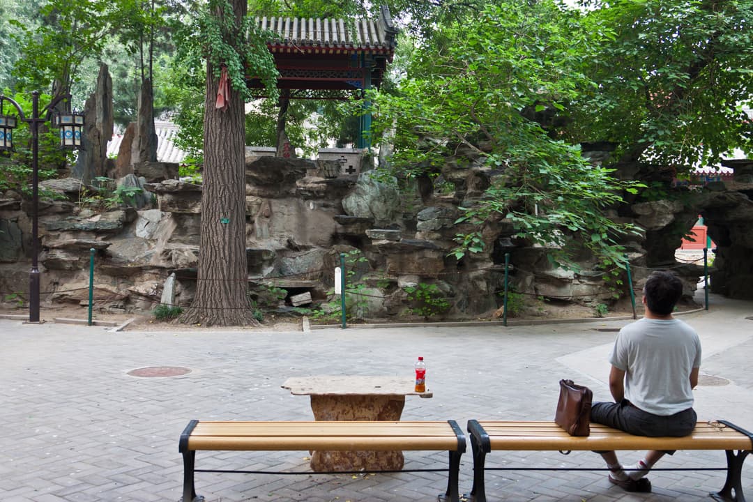 Rockery garden and pavilion within the White Cloud Temple grounds.