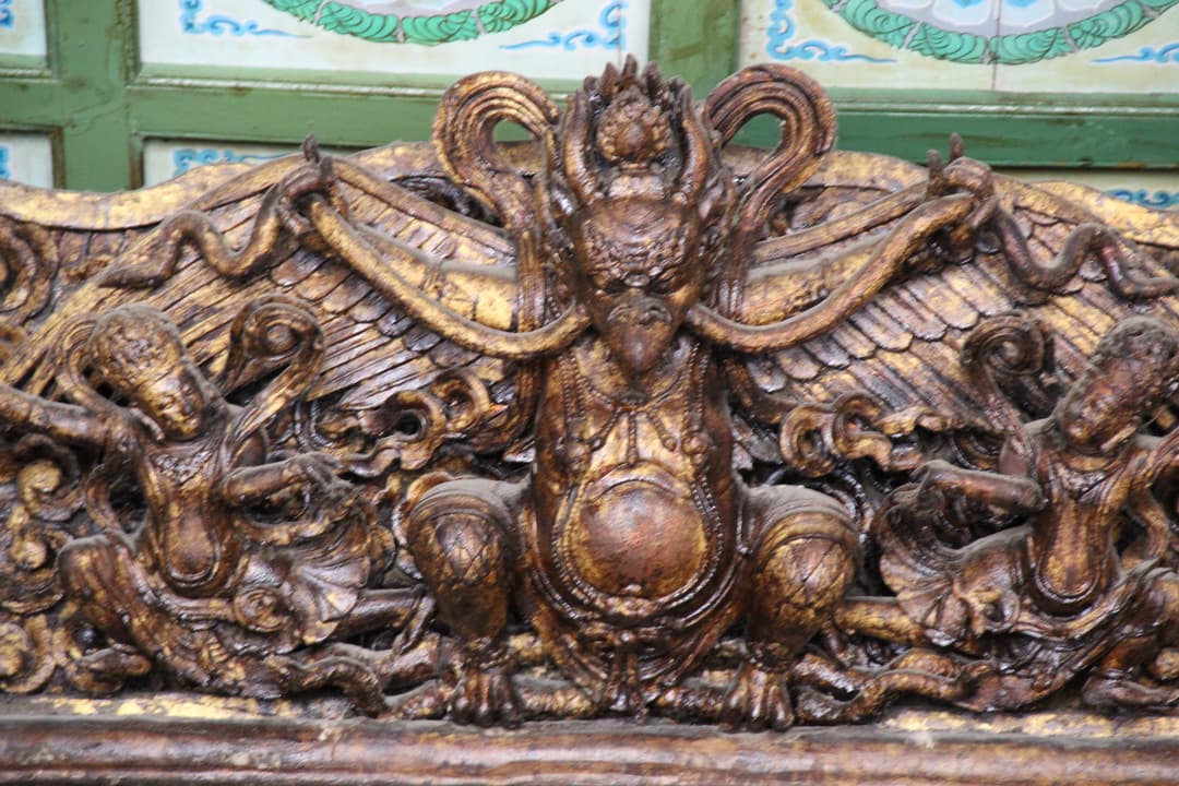 Intricate gilded wood carving of Garuda, White Horse Temple
