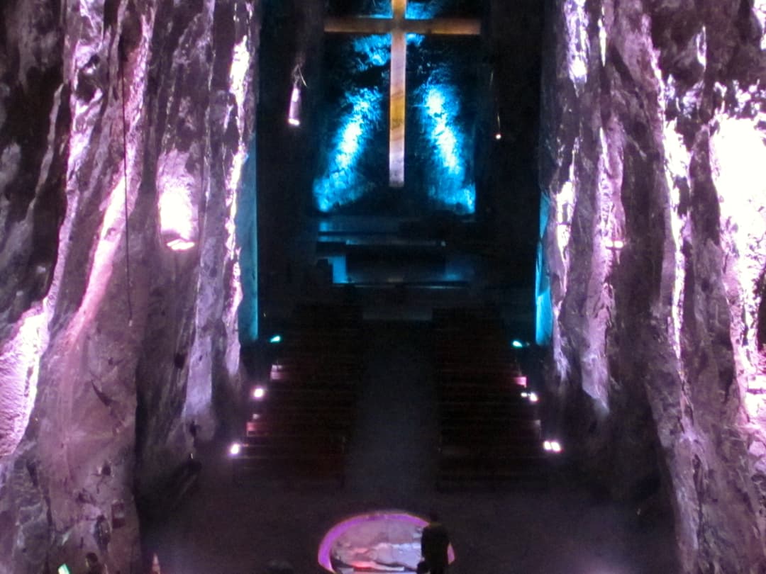 Elevated view of the central nave and illuminated cross.