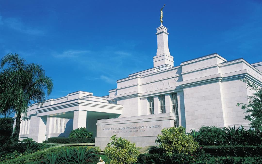 Low-angle daytime view of the San José Costa Rica Temple and spire.