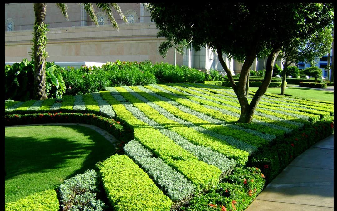 Manicured patterned garden beds on the temple grounds.