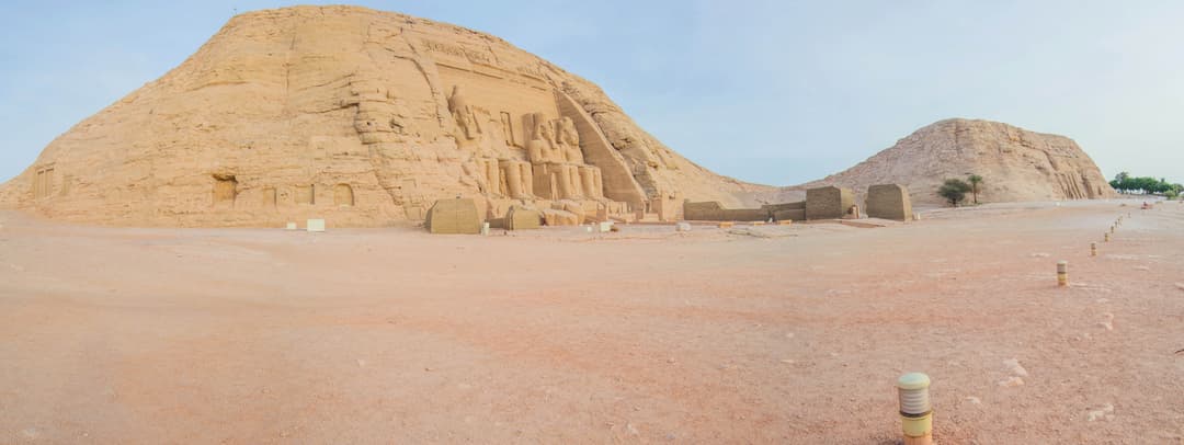 A close-up of one of the colossal statues of Ramesses II.