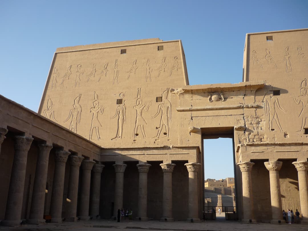 The open courtyard of the Temple of Edfu, surrounded by colonnades.