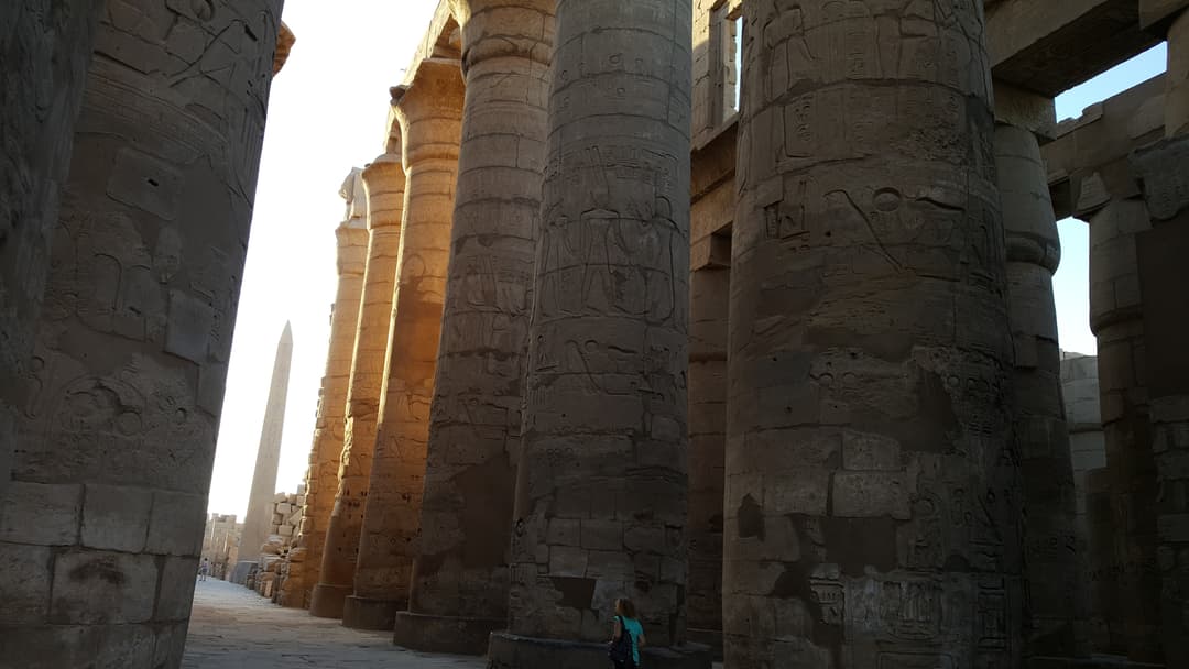 A view of the ruins of Karnak Temple, showcasing its vast scale.