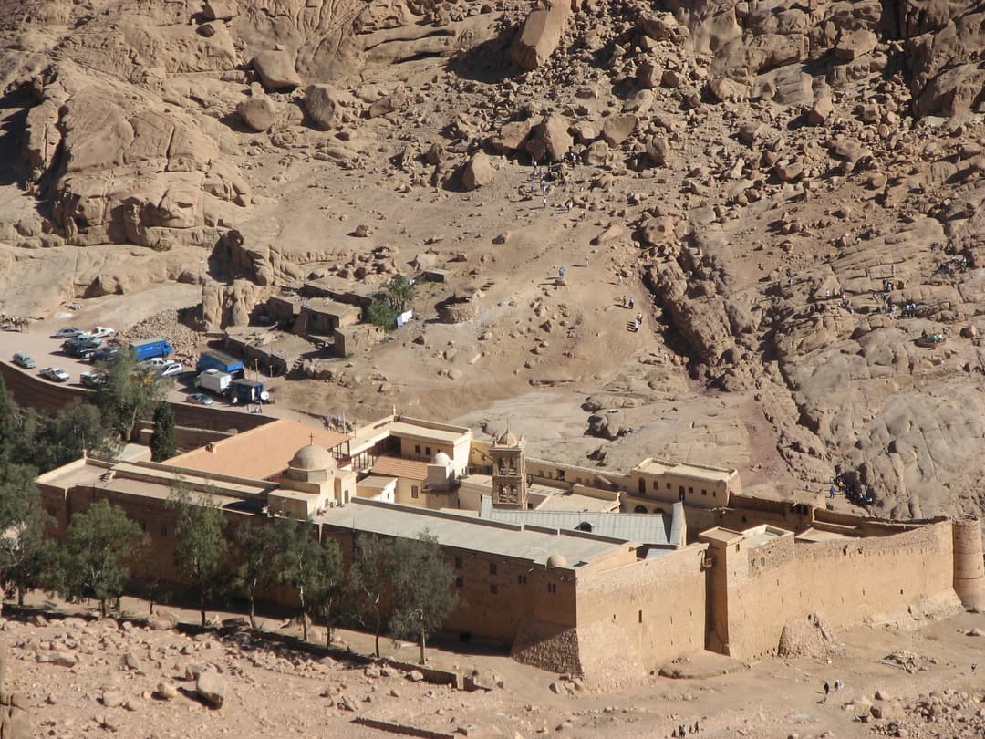 High-angle view of Saint Catherine's Monastery and surrounding rocky slopes