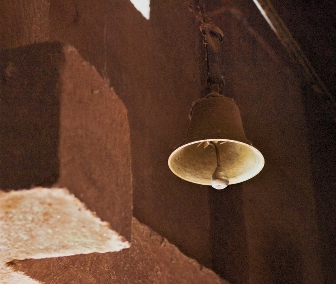 Hanging bell inside a rock-hewn church in Lalibela