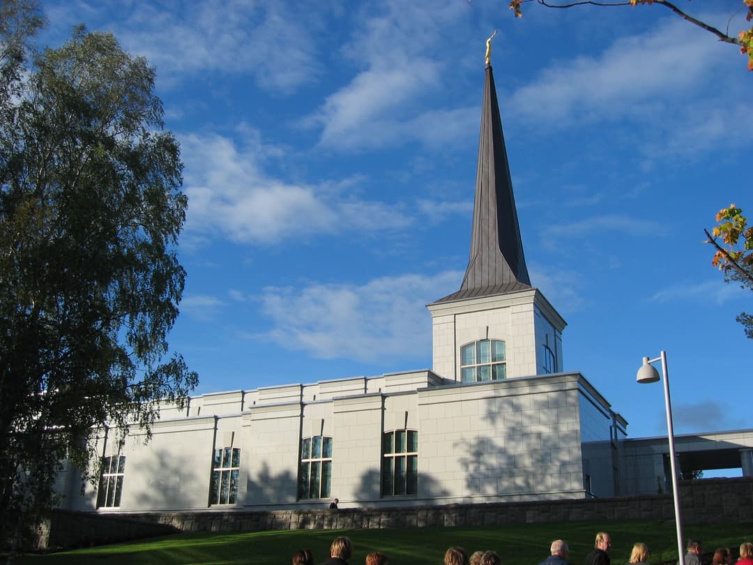 Helsinki Finland Temple, side view with spire and Angel Moroni. Sunny day.