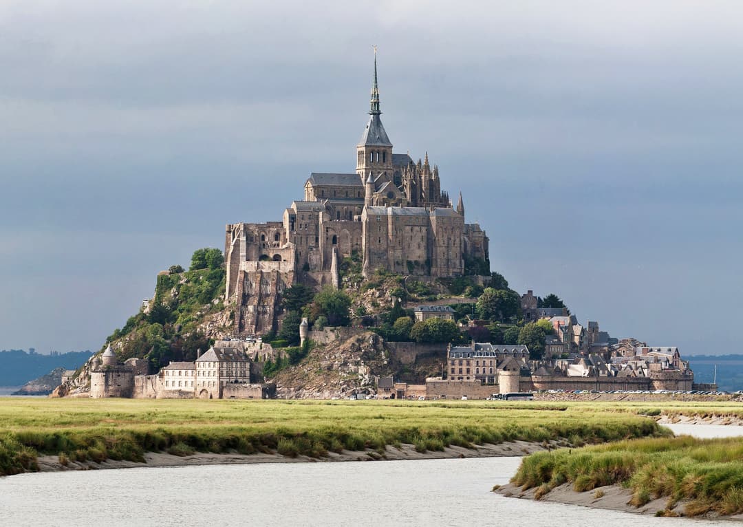Mont-Saint-Michel viewed across the Couesnon River and salt marshes