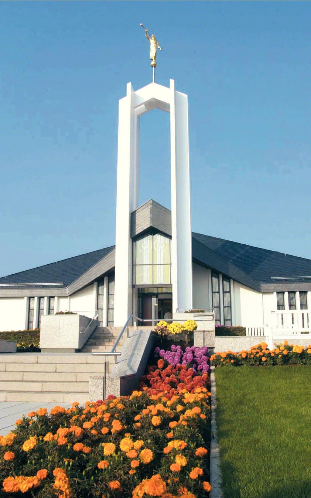 The Freiberg Germany Temple surrounded by lush greenery.