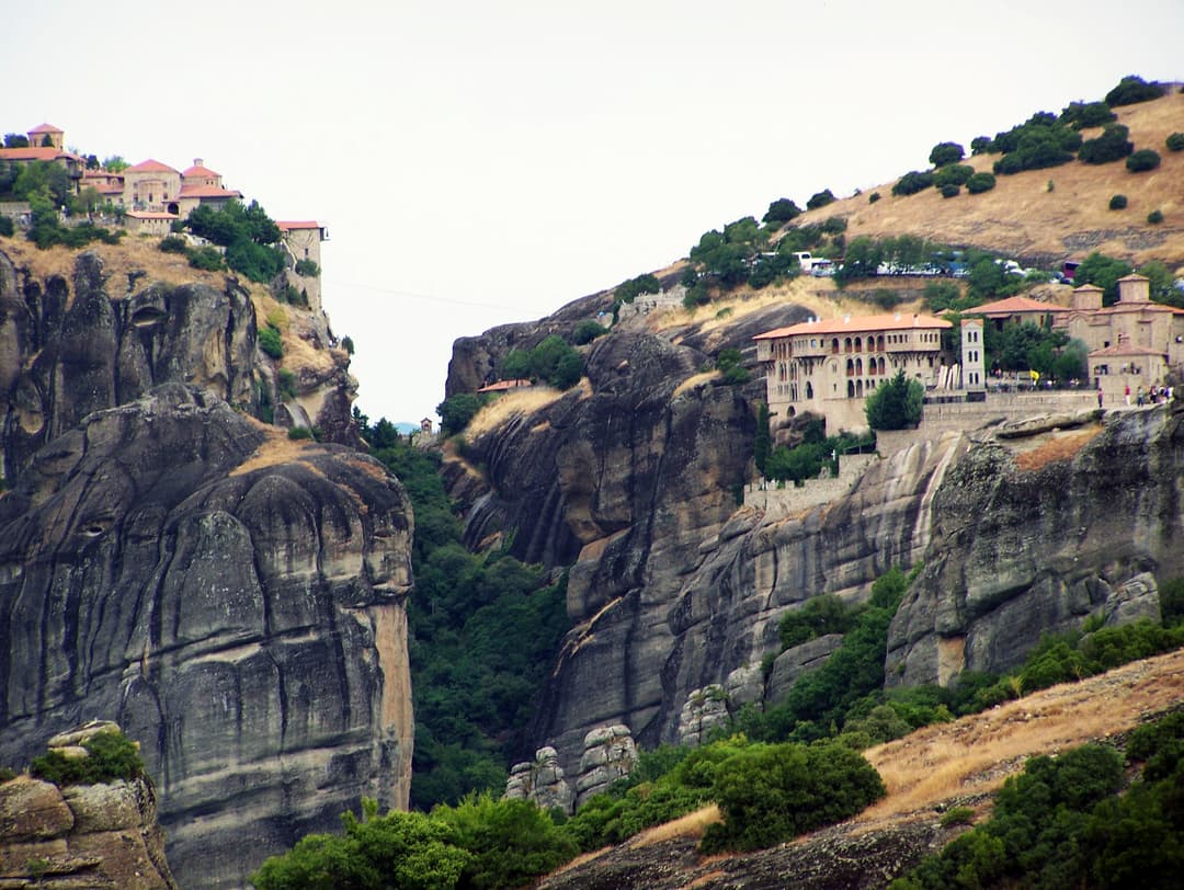 Monasteries of Varlaam and Great Meteoron on Meteora rock cliffs.