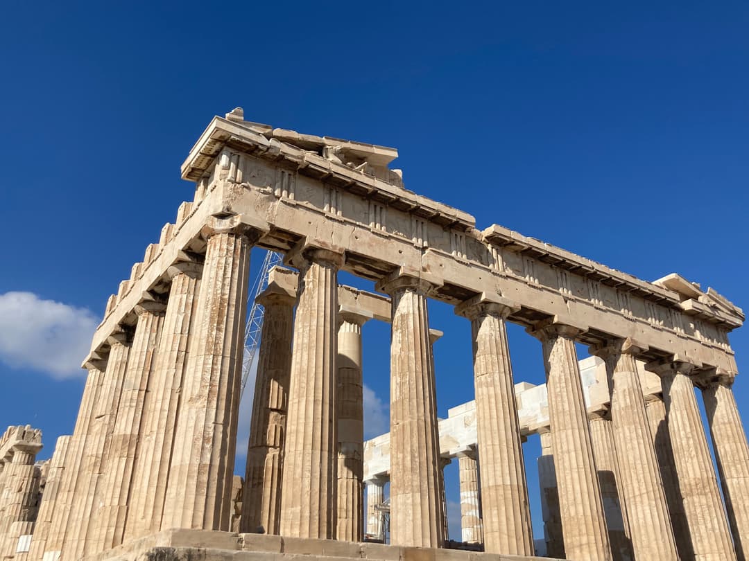 Low-angle view of the Parthenon's corner colonnade and entablature.