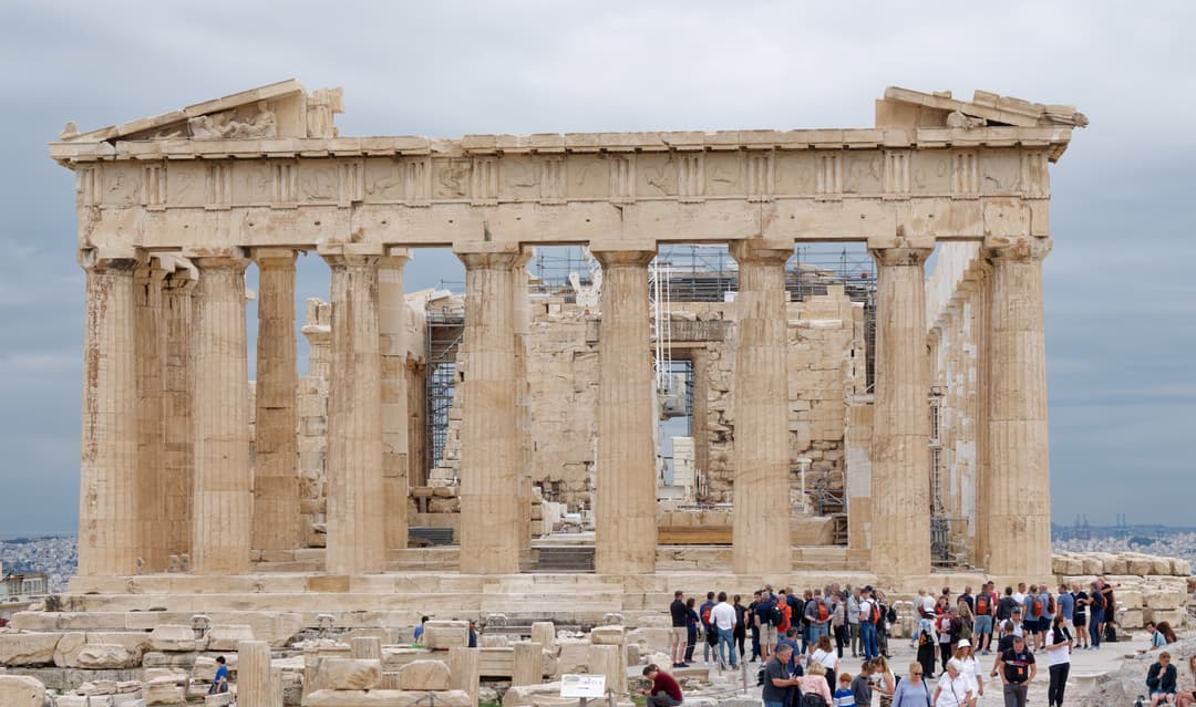 Frontal view of the Parthenon's west facade under an overcast sky
