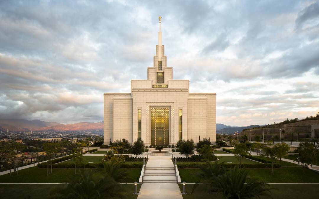 Front view of the Tegucigalpa Honduras Temple and grounds at twilight.