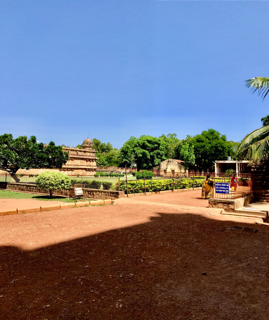 Landscaped grounds and pathways of Brihadisvara Temple in daytime