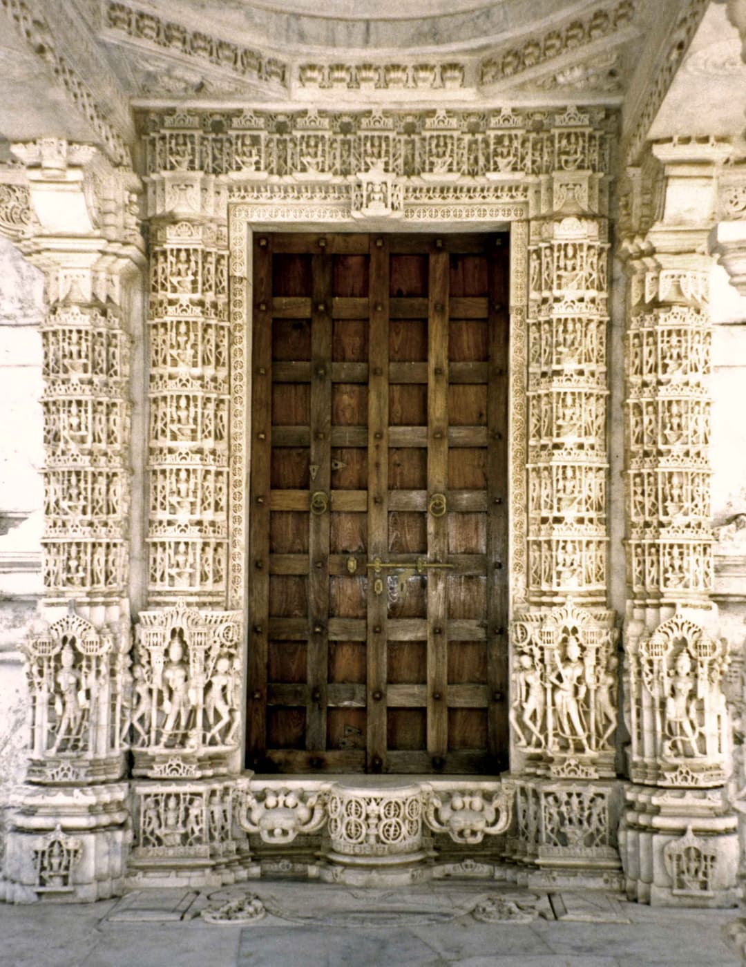 Carved marble doorway to an interior shrine, Dilwara Temples