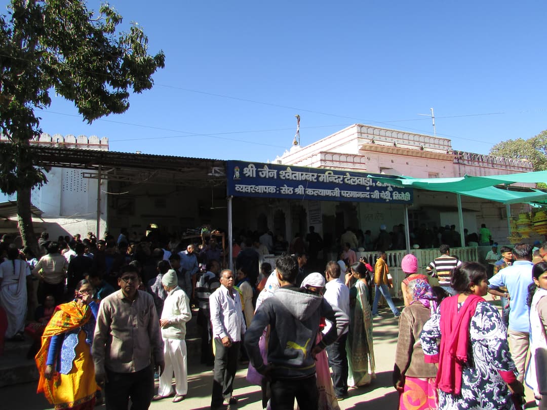 Entrance to the Dilwara Jain Temples complex crowded with visitors