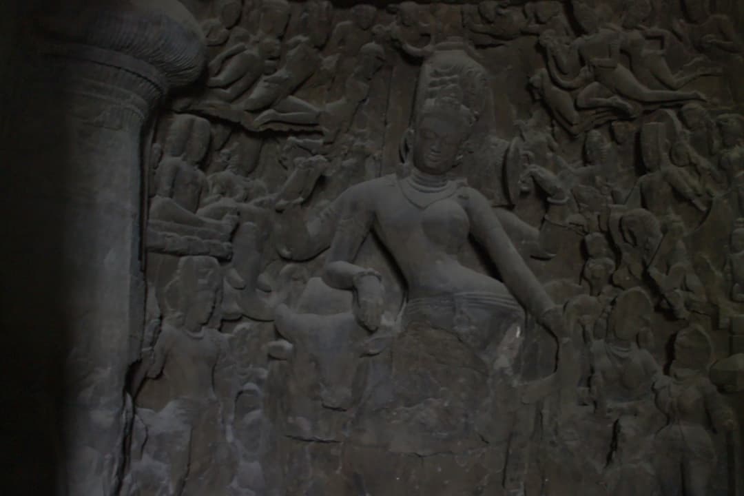 A pillared mandapa (hall) inside one of the caves.