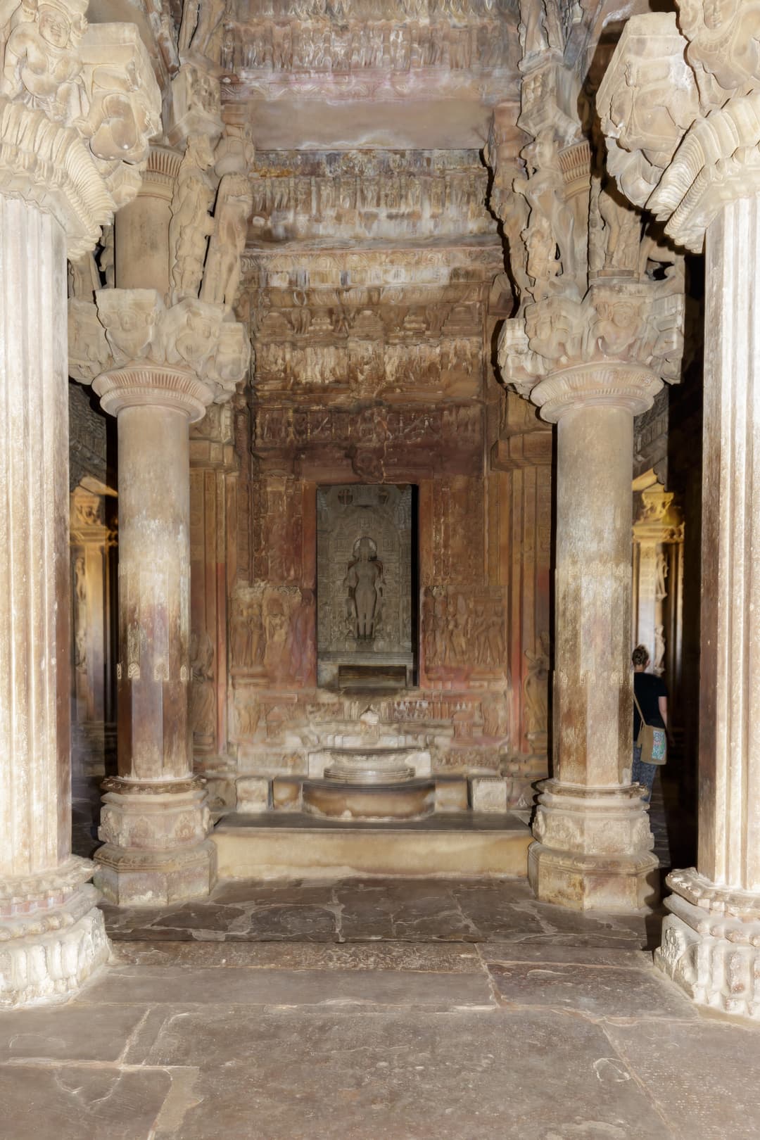 Interior view showing carved stone pillars and the sanctum entrance
