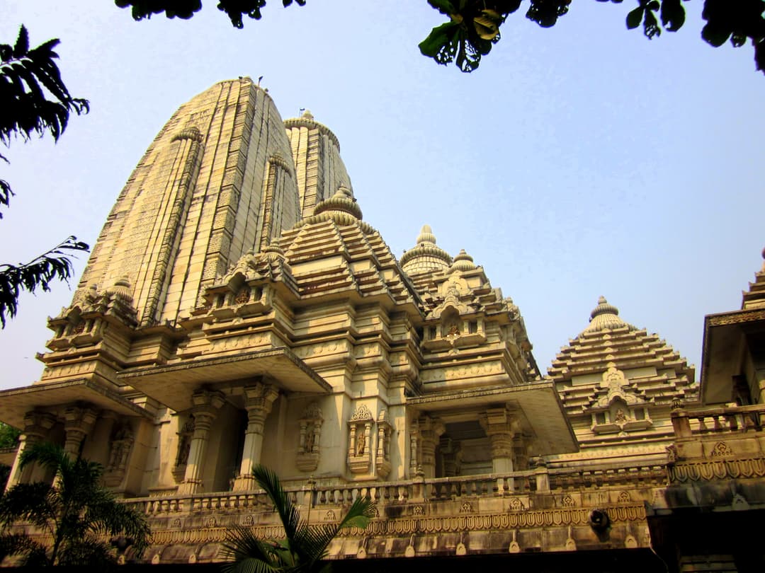Low-angle view of the cream sandstone spires of Birla Mandir, Kolkata.