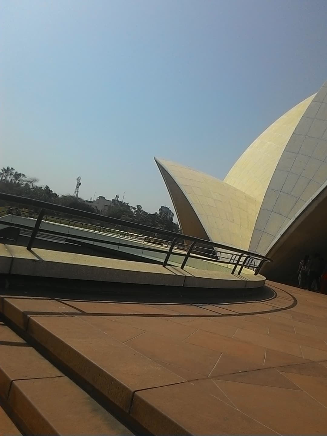 Low-angle view of the marble petals and walkway at the Lotus Temple