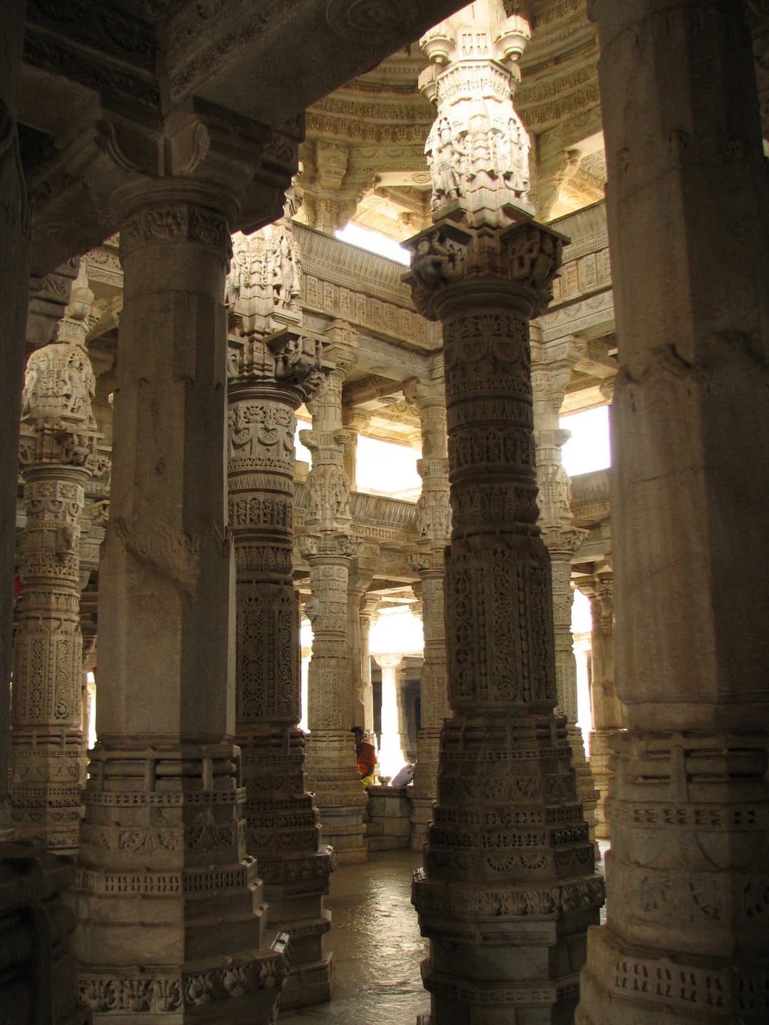 Intricately carved marble pillars inside the hypostyle hall