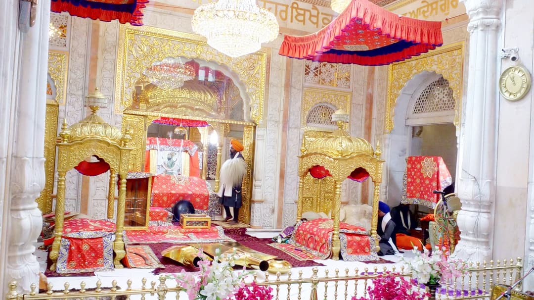 Ornate gilded canopies in the inner sanctum of Takhat Sri Patna Sahib.