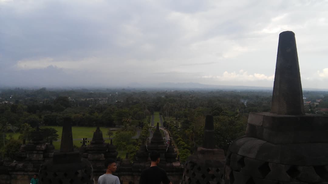 Panoramic landscape view from the upper stupa terrace of Borobudur