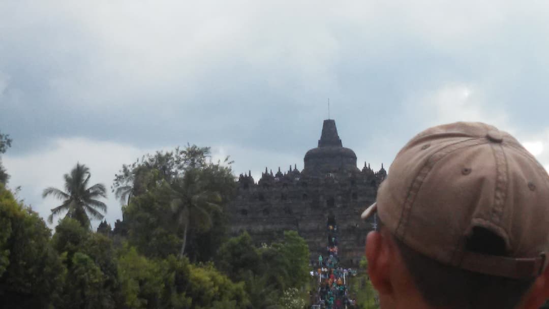 View of the central staircase ascending to Borobudur's main stupa.