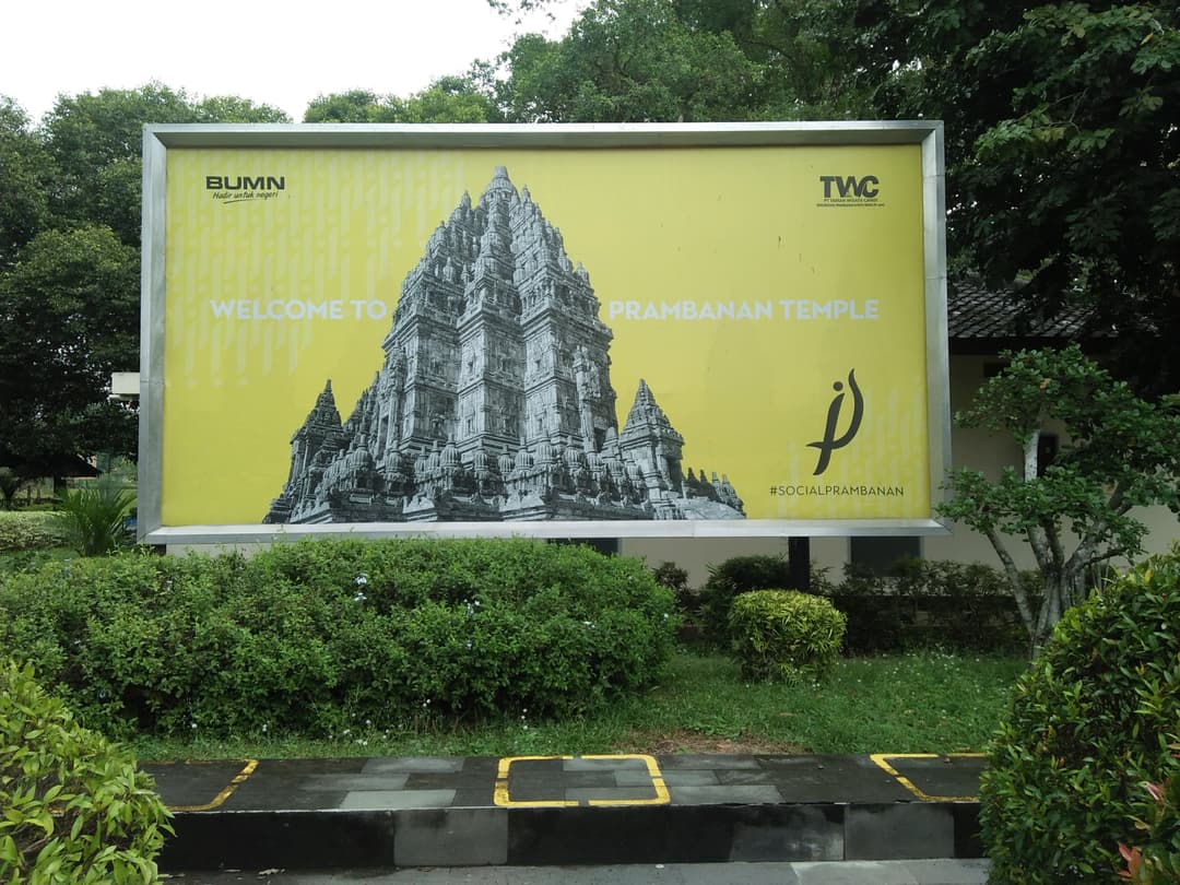 Welcome billboard on the grounds of Prambanan Temple.