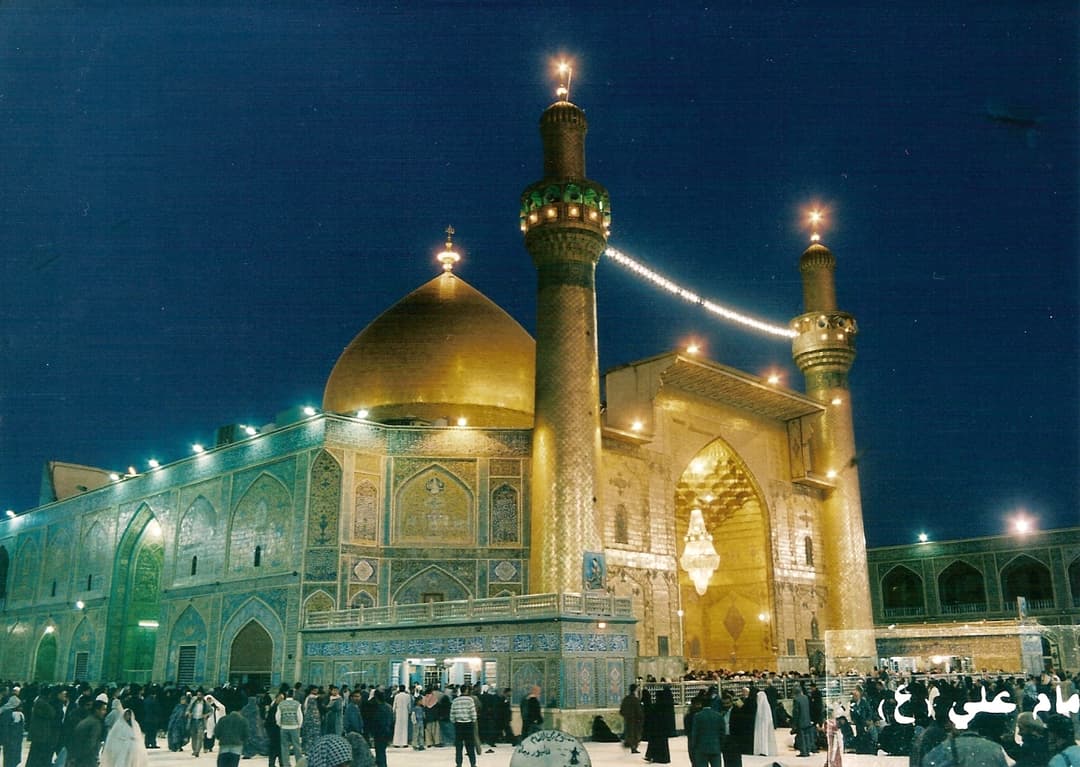 A detailed view of the shrine's intricate tilework and golden accents.