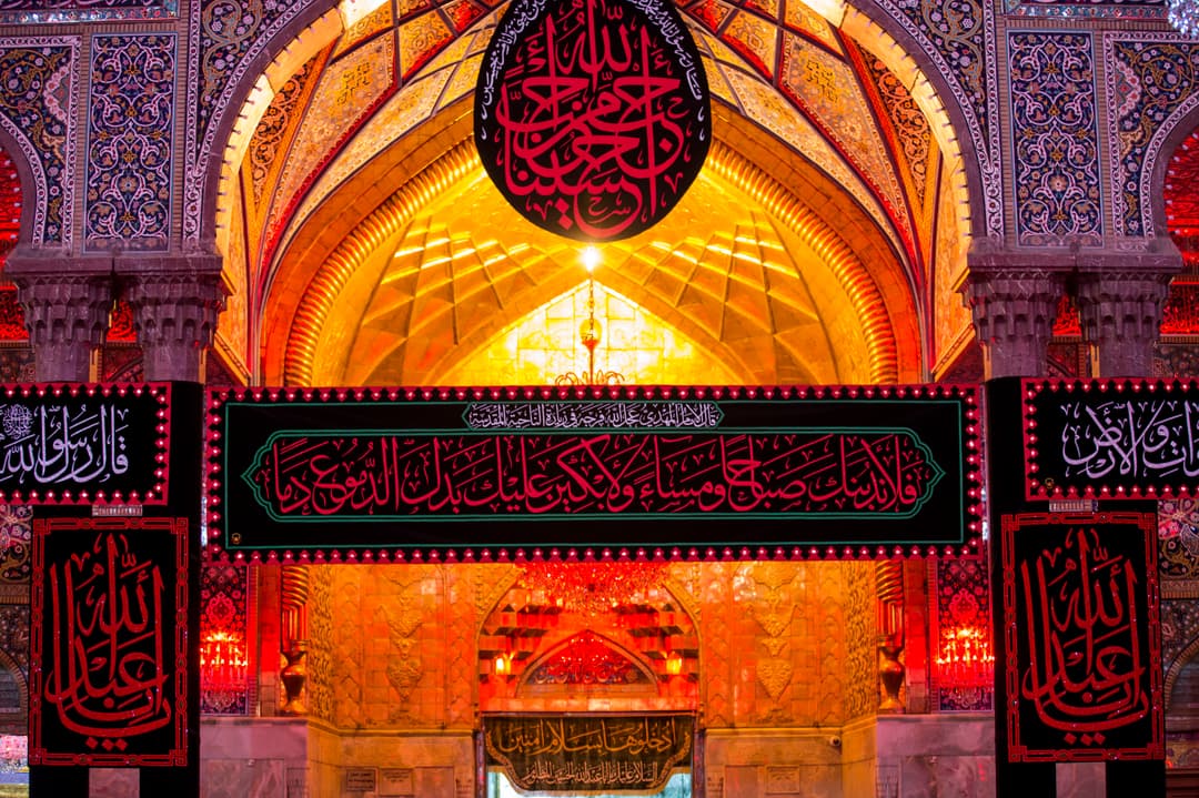 Intricate tilework adorns the walls of the shrine.