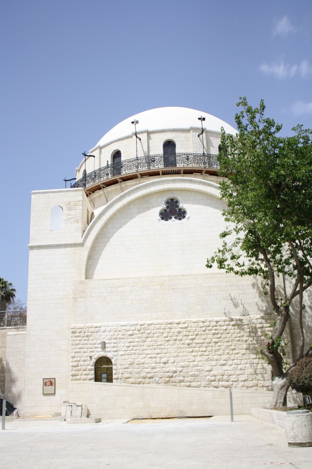 Arched windows illuminate the sanctuary with natural light.